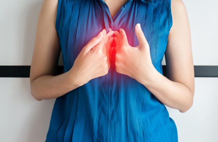 Asian,Woman,Having,Or,Symptomatic,Reflux,Acids,gastroesophageal,Reflux,Or,Gerd