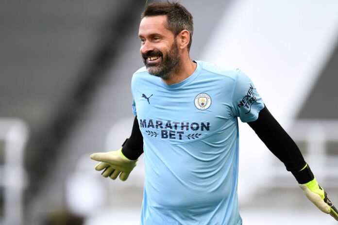 scott-carson-manchester-city-2020-21_fvg8hdcqxy7n1u75zq92fnzib