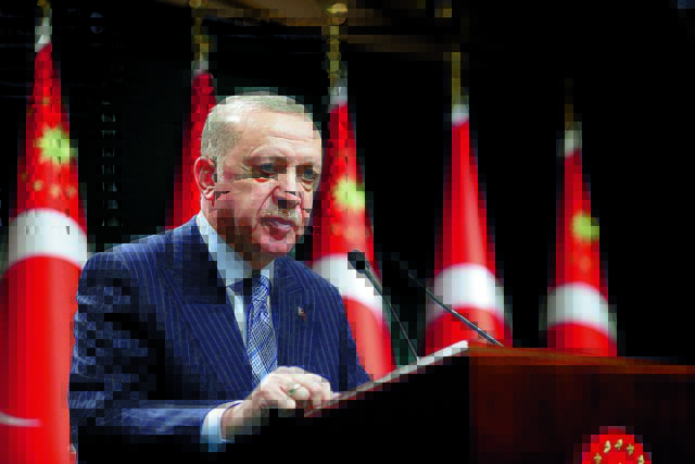 FILE PHOTO: Turkish President Tayyip Erdogan gives a statement after a cabinet meeting in Ankara